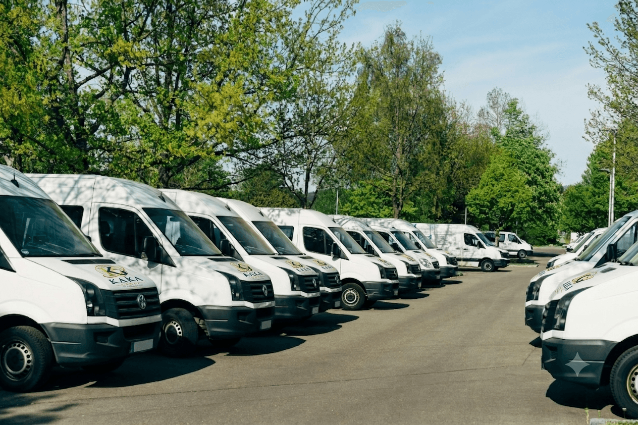 KAKA Group delivery vans lined up at the depot